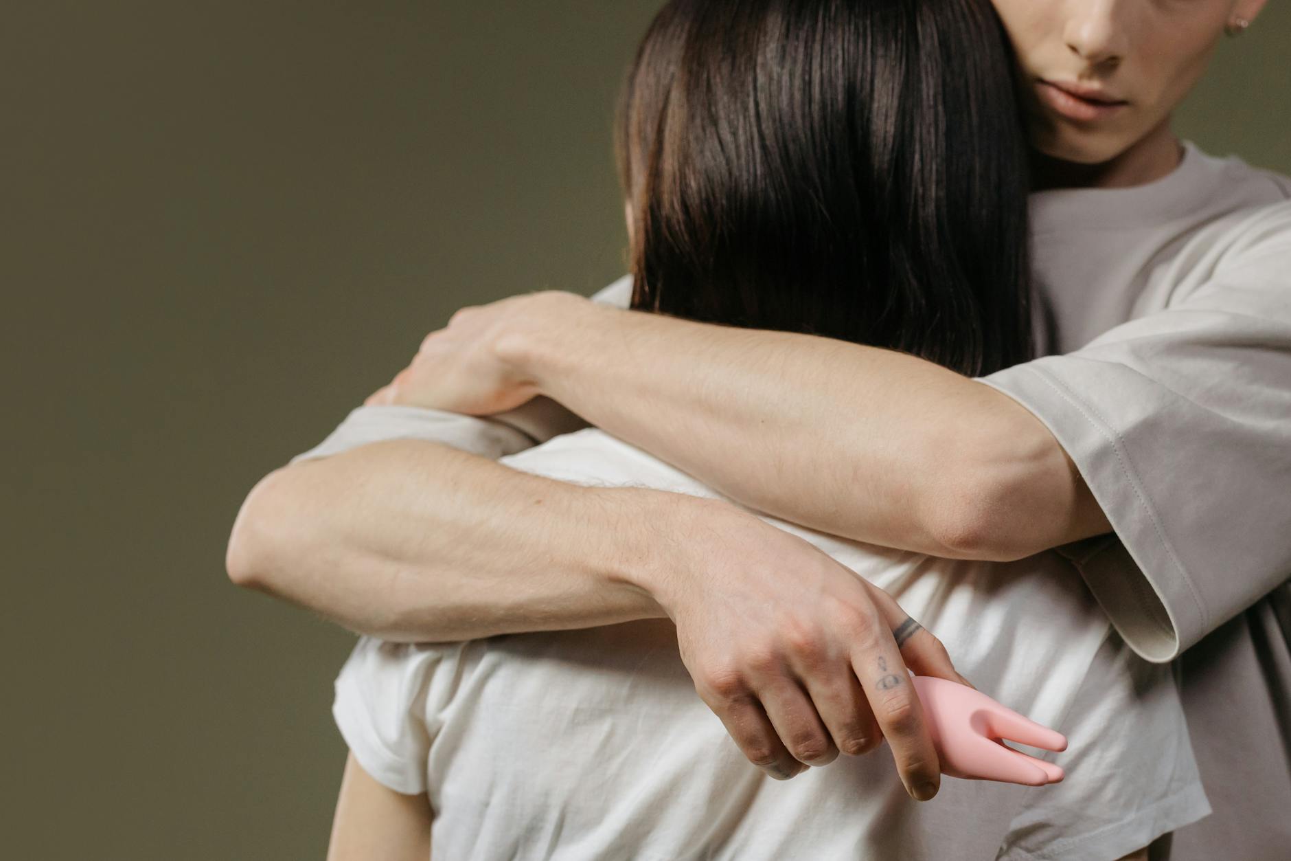 Close-up of a couple embracing, highlighting intimacy and connection after healing.